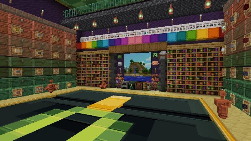 Minecraft room featuring copper chests, bookshelves, and a row of rainbow shulker boxes.